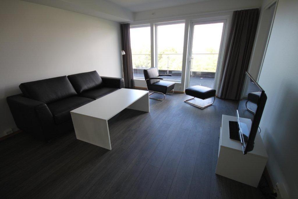 Flotmyrgarden Apartment Hotel Хёугесунн Экстерьер фото